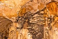 Limestone formations on the wall of an underground cave. Royalty Free Stock Photo