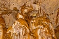 Limestone formations on the wall of an underground cave. Royalty Free Stock Photo