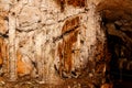 Limestone formations on the wall of an underground cave. Royalty Free Stock Photo