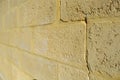 Limestone brick wall with a crack Royalty Free Stock Photo