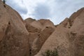 Limestone pyramids with beautiful old rock formations in Cappadocia, Goreme, Turkey Royalty Free Stock Photo