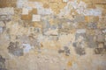 Limestone, sandstone brown, grey background. Aged, peeled, vintage, empty wall for backdrop. Close up view with details. Royalty Free Stock Photo