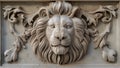 A limestone sculpture plaque featuring a detailed carving of a lions head.