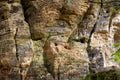 Limestone walls covered with carved letters