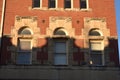 Limestone window surrounds on an old building in Waxahachie Texas Royalty Free Stock Photo