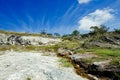 Limestones at Songwe Hot Springs against a Mountain background in Mbeya, Tanzania