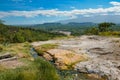 Limestones at Songwe Hot Springs against a Mountain background in Mbeya, Tanzania