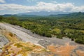 Limestones at Songwe Hot Springs against a Mountain background in Mbeya, Tanzania