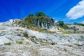 Limestones at Songwe Hot Springs against a Mountain background in Mbeya, Tanzania