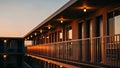 Modern Hotel Balcony at Sunset with Warm Lighting, Luxury Hospitality Accommodation, Liminal Royalty Free Stock Photo