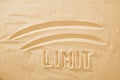 Limit concept, line and word on sand Royalty Free Stock Photo