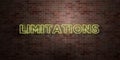 LIMITATIONS - fluorescent Neon tube Sign on brickwork - Front view - 3D rendered royalty free stock picture