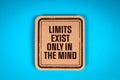 LIMITS EXIST ONLY IN THE MIND. Cardboard sticker with text on a blue background