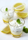 Limoncello - italian Dessert. Lemon Cheesecake Mousse with Whipped Cream in cups.