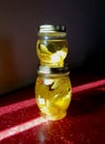 Limoncello in two glass jars