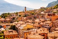 Limone Sul Garda cityscape on the shore of Garda lake surrounded by scenic Northern Italian nature. Amazing Italian cities of Royalty Free Stock Photo