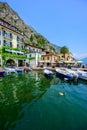 Limone sul Garda - harbour village at Lake Garda with beautiful mountain scenery, Italy - travel destination Royalty Free Stock Photo