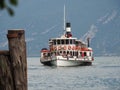 Limone Sul Garda, Italy. Lake Garda. The historic Zanardelli sternwheeler paddleboat approaching the pier in the historic center