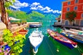 Limone sul Garda turquoise waterfront and boats view
