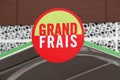 Grand Frais supermarket logo on a signboard