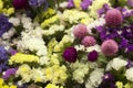 Limonium, Gomphrena globosa - many colorful flowers in a bouquet. Yellow, white, blue and pink dried flowers flowers, background