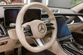 Limousine, luxury car Mercedes Benz S500 S class w223 interior dashboard with steering wheel close up view.