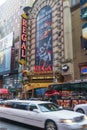 Limousine passing the Regal Cinema in New York City Royalty Free Stock Photo