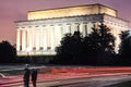 Lincoln memorial at night with couple stand still Royalty Free Stock Photo