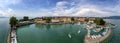 Amazing panorama of Harbor on Lake Constance with a statue of a lion at the entrance in Lindau,