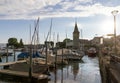 Lindau harbor on Lake Constance with ships, houses, harbor entrance and cafes at summer Royalty Free Stock Photo