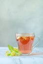 Linden tea in a transparent cup with linden flowers Royalty Free Stock Photo