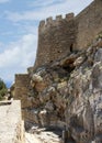 Lindos, the Acropolis Hill, ruins of the ancient fortress and the Castle of the Knights of St. John. Lindos, Rhodes, Greece Royalty Free Stock Photo