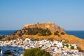 Lindos, Greece - August 11, 2018: Landscape of the white houses of the city of Lindos at sunset, Greece Royalty Free Stock Photo