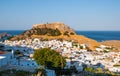 Lindos, Greece - August 11, 2018: Landscape of the white houses of the city of Lindos at sunset, Greece