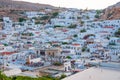 Lindos, Greece - August 11, 2018: Landscape of the white houses of the city of Lindos at sunset, Greece