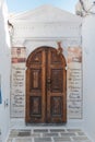 Lindos,Greece. 05/29/2018. Traditional door to household in Lindos Town. Greek Island of Rhodes. Europe Royalty Free Stock Photo