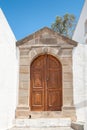 Lindos, Greece. 05/29/2018. Traditional door to household in Lindos Town. Greek Island of Rhodes. Europe Royalty Free Stock Photo