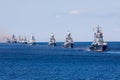 A line ahead of modern russian military naval battleships warships in the row, northern fleet and baltic sea fleet, summer sunny