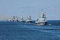 A line ahead of modern russian military naval battleships warships in the row, northern fleet and baltic sea fleet, summer sunny