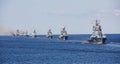 A line ahead of modern russian military naval battleships warships in the row, northern fleet and baltic sea fleet, summer sunny