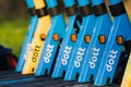 Line of blue and yellow Dott electric scooters Royalty Free Stock Photo
