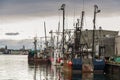 Line of boats along Homer`s Wharf