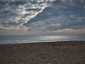 Line in bubbled clouds and pebble beach