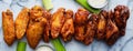 Line of buffalo chicken wings drenched in different sauces Royalty Free Stock Photo