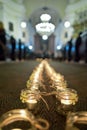 Line of candles in the baroque church Royalty Free Stock Photo