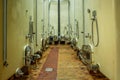 A line of cement vats used to make wine in a cellar of a winery