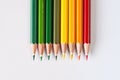 Line of colored pencils red tone and green tone Royalty Free Stock Photo