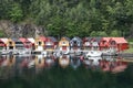 Line of colorful houses by a lake in a fishing village in norway Royalty Free Stock Photo