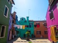Line of Colourful Washing Between Coloured Houses of Burano, Venice, Italy