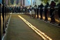 Line of flaming candles in the baroque church Royalty Free Stock Photo